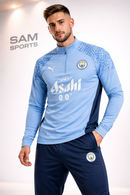 Conjunto Agasalho Manchester City